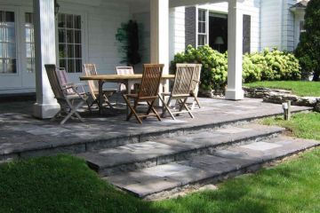 Brick patio with cultured stone steps